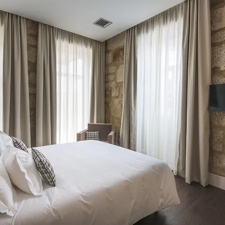 מלון Casa Muralhas 3*